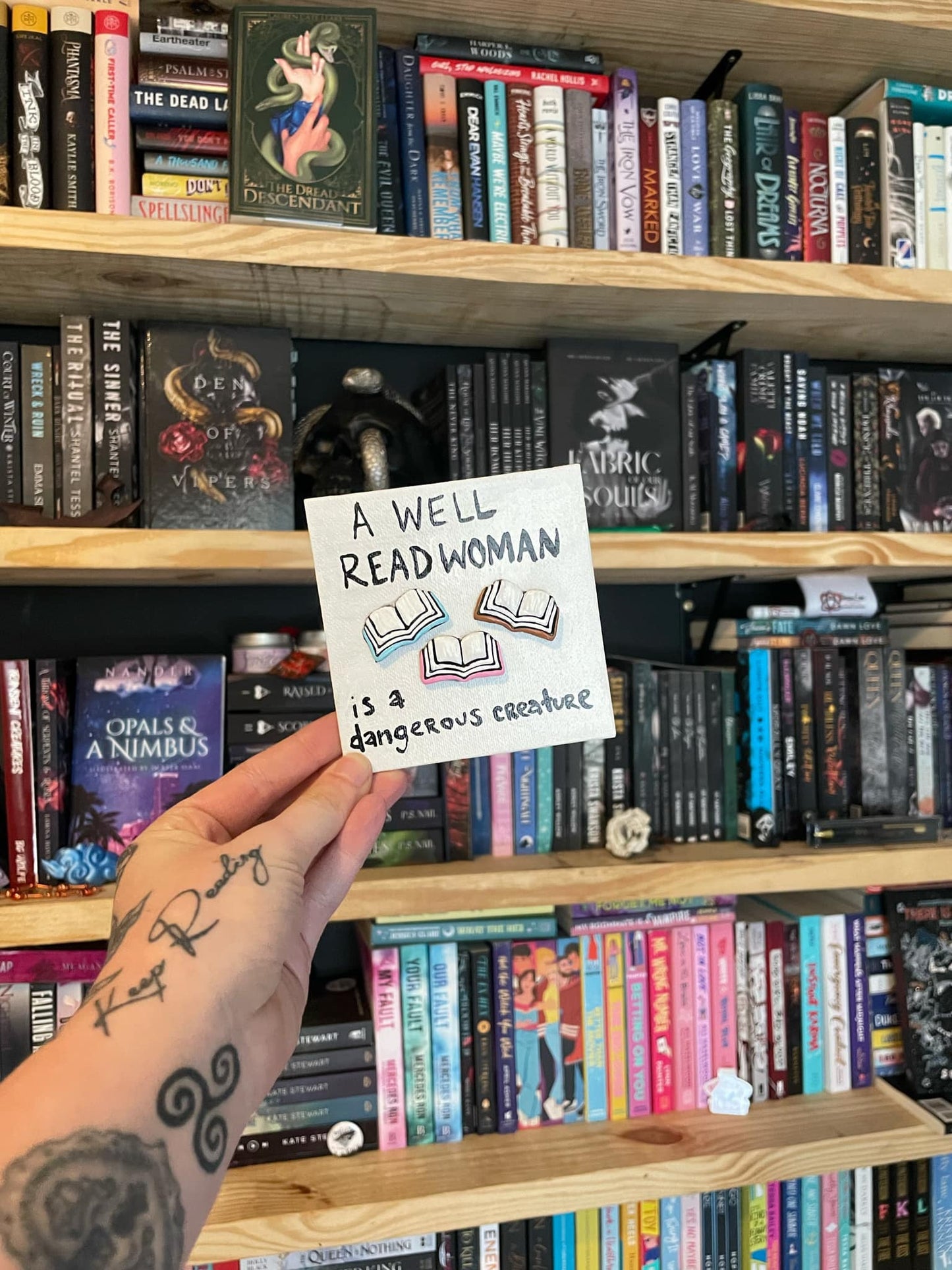 Dangerous Creature; Bookshelf Sign